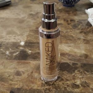Urban Decay Naked Skin Shade 2.5 bottle is3/4 full